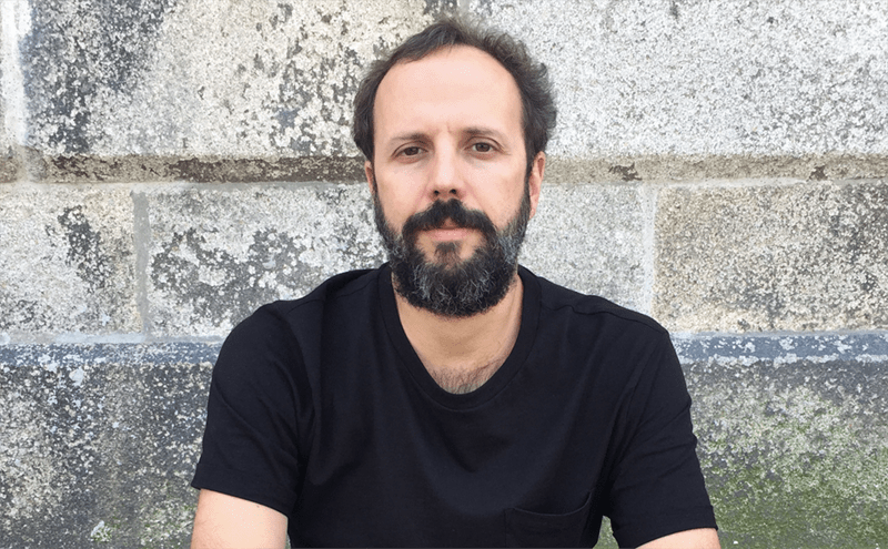 O cineasta, montador e curador Paulo Sacramento